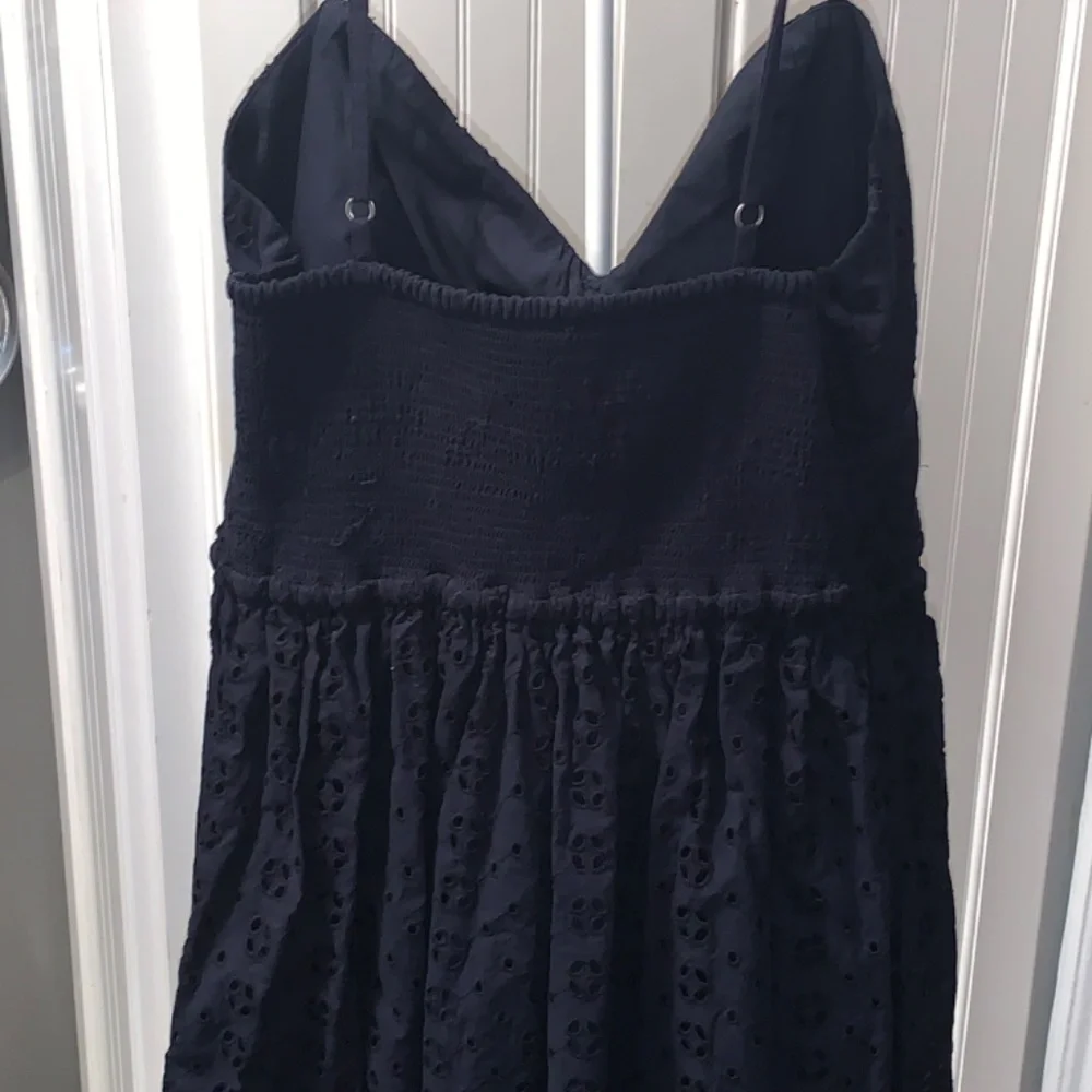 J crew spaghetti strap eyelet‎ mini dress. Worn a few times.